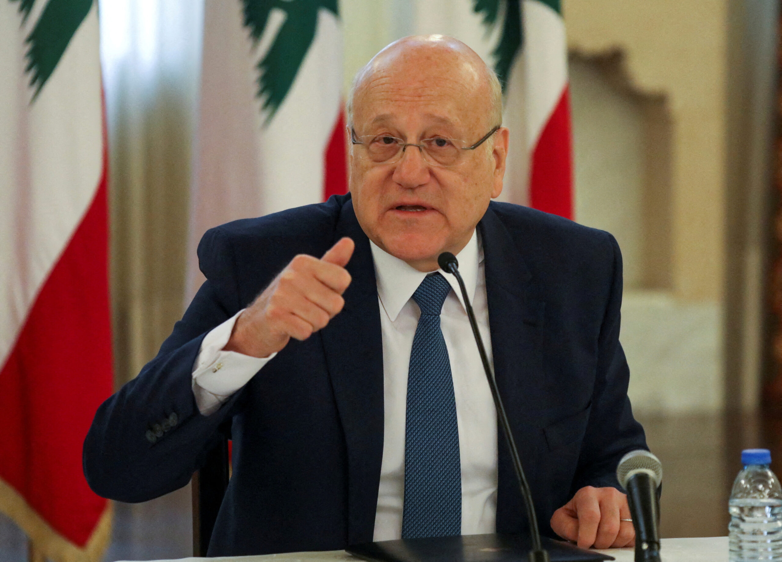 FILE PHOTO: Lebanese Prime Minister Najib Mikati gestures during a news conference on the latest developments in the country at the government palace in Beirut