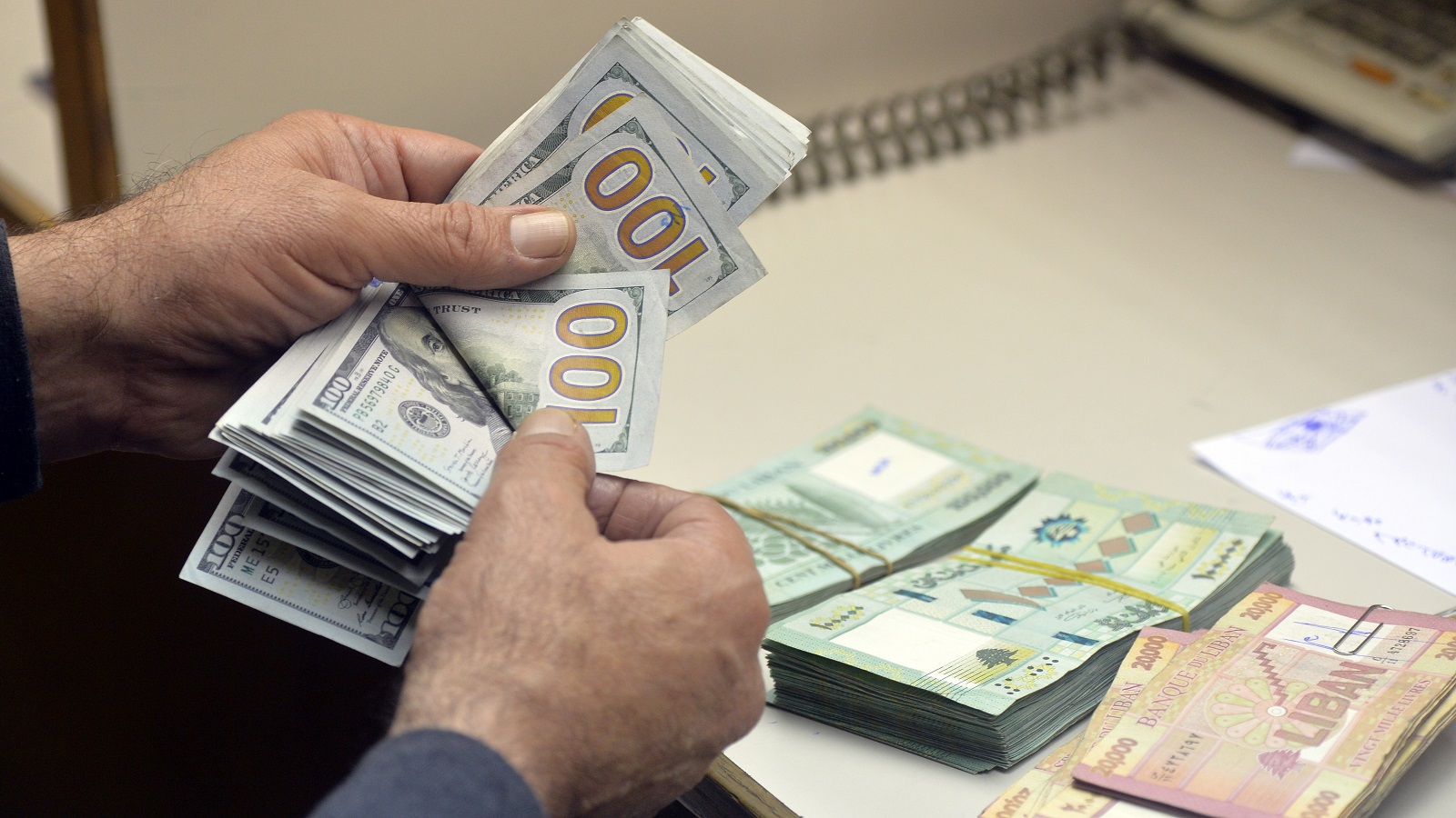 Lebanese currency sinks to new low